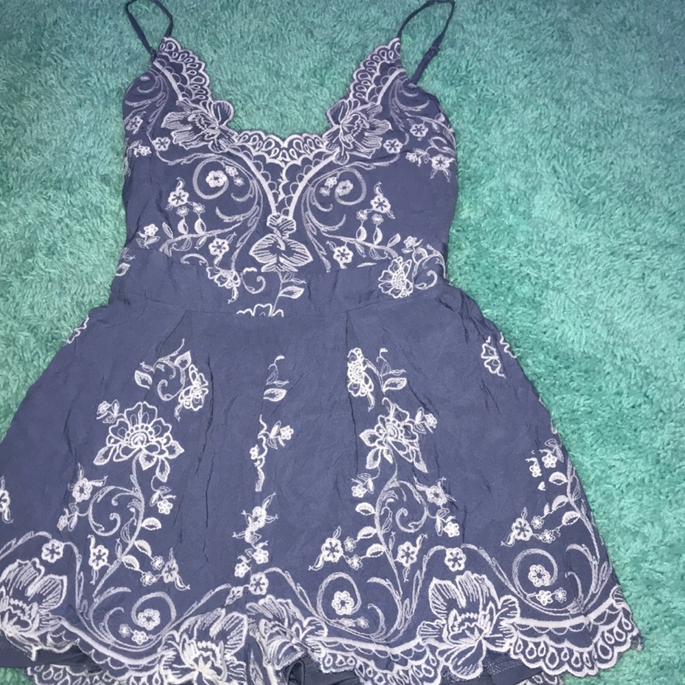 a light navy blue romper